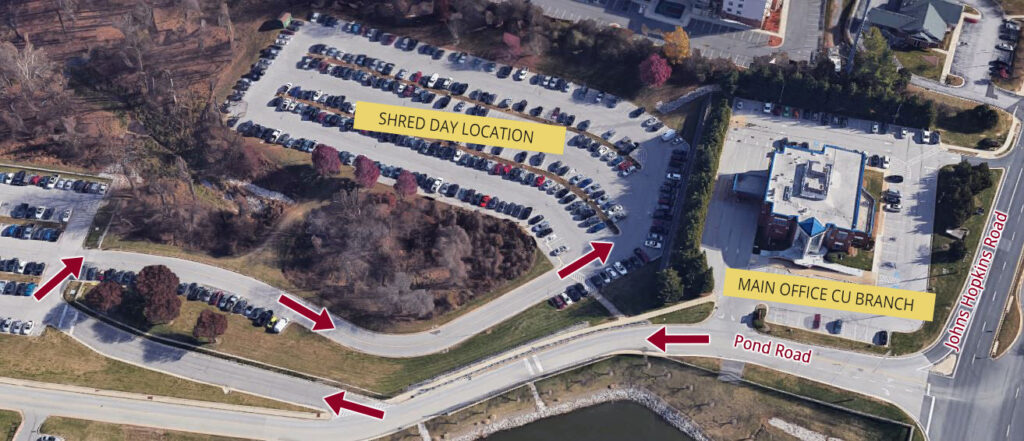 Aerial view of the APL FCU parking lot with directions to Shred Day Location